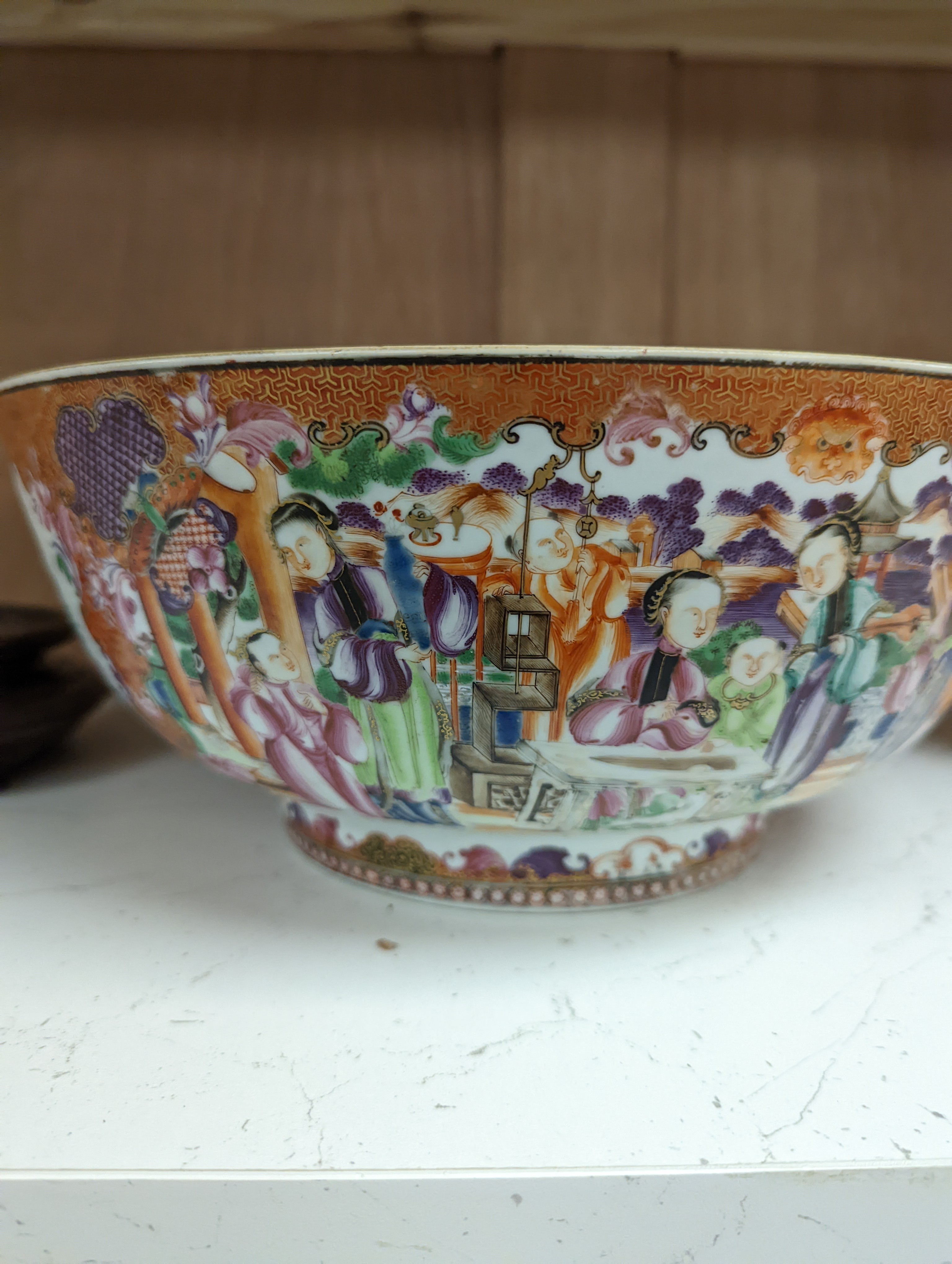 An 18th century Chinese export mandarin pattern porcelain bowl with hardwood stand 28.5cm diameter
